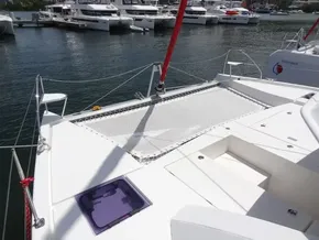 Leopard 40 catamaran deck with netting, docked in a marina, 2021 model.