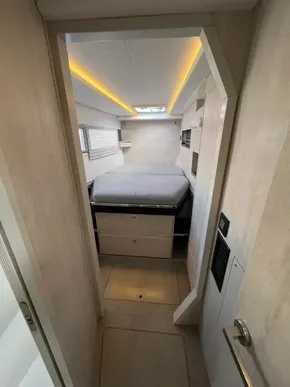 2019 Leopard 45 yacht cabin interior with modern design and ambient lighting.