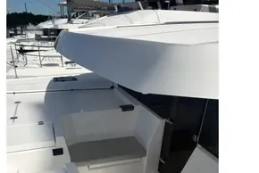 Modern Leopard 46 yacht deck, 2025 model, featuring sleek seating and spacious layout.