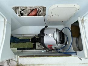 Engine in well raised, gas locker and fuel locker as well as general stowage locker
