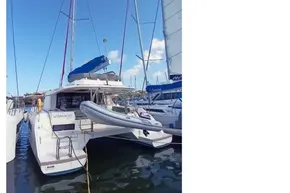 2022 Leopard 45 catamaran docked at marina, featuring sleek design and modern amenities.