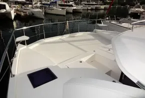 2017 Leopard 43 Powercat yacht docked in a marina with other boats.
