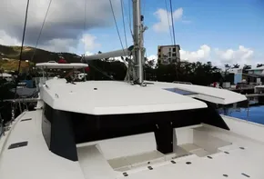 2017 Leopard 45 catamaran docked at a marina with clear skies.