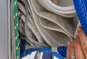 Folded sails on a 2020 Beneteau Oceanis 46.1 yacht with blue sail cover.