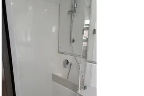 Modern shower area in 2025 Leopard 46 yacht, featuring sleek design and fixtures.