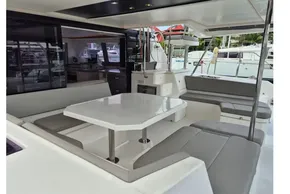 Spacious seating area on a 2020 Leopard 45 catamaran with modern interior design.