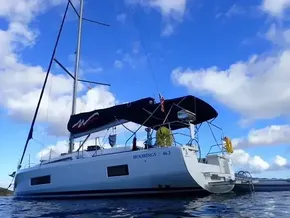 2020 Beneteau Oceanis 46.1 sailboat on water under blue sky.
