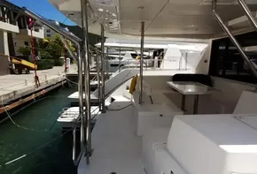2017 Leopard 43 Powercat docked, featuring spacious deck and seating area.