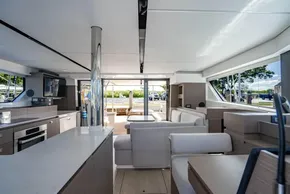 Luxurious interior of 2025 Leopard 46 yacht with modern furnishings and panoramic windows.