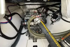 Engine room of 2024 Leopard 40 Powercat with visible hoses and wiring.