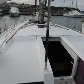 Beneteau Oceanis 51.1 sailboat deck, 2018 model, docked in a marina.