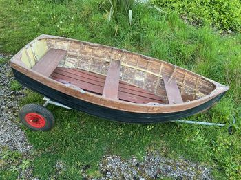 Classic mahogany clinker rowing boat