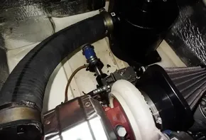 Engine compartment of a 2017 Leopard 43 Powercat with visible components and hoses.
