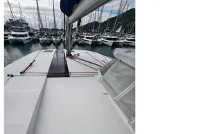 2019 Leopard 50 catamaran docked in a marina, surrounded by other boats.