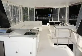 2018 Leopard 43 Powercat interior with helm station and seating area.
