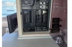 Control panel inside 2018 Leopard 45 yacht, featuring navigation and communication equipment.