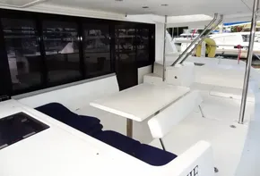 2018 Leopard 43 Powercat yacht with spacious outdoor seating and dining area.