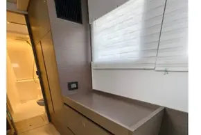 Interior of 2021 Leopard 50 yacht with wooden cabinetry and modern design.