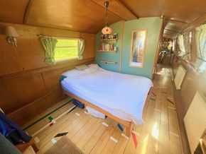 Cabin featuring king-size bed and plenty of storage