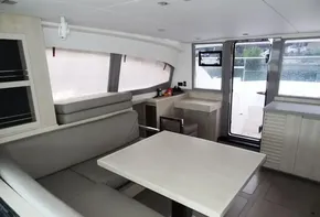 Interior of 2018 Leopard 43 Powercat with modern seating and dining area.