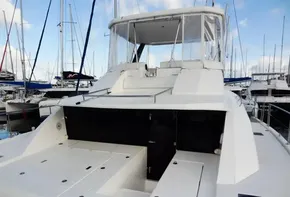 2018 Leopard 43 Powercat yacht docked at marina, rear view.
