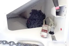 Anchor locker of 2019 Jeanneau Sun Odyssey 440 with chain and rope.