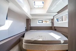 Luxurious cabin interior of 2025 Leopard 46 yacht with modern design and ample natural light.