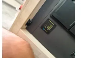 Control panel inside a 2019 Leopard 50 yacht, featuring a wooden frame.