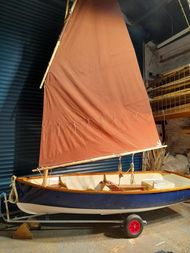 Lug rig wooden dinghy