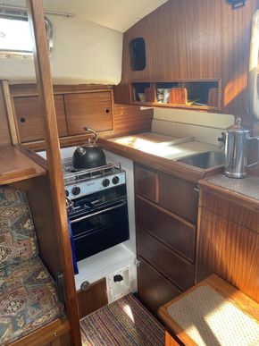 Galley showing safety belt & Gas Isolating Sw. in Bulkhead at top.