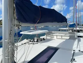 2020 Leopard 50 yacht deck with covered sail, docked in a marina.