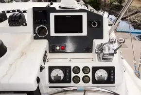 Control panel of a 2017 Leopard 45 yacht with navigation and engine gauges.