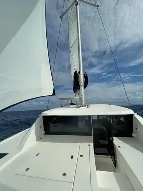 Leopard 40 catamaran sailing on open sea, 2020 model.