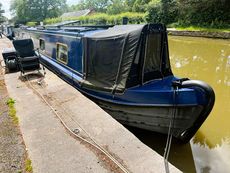 Squeak By - 69' Black Prince Cruiser Stern