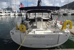 2020 Beneteau Oceanis 46.1 sailboat docked at marina, rear view.