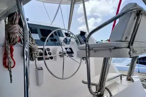 Helm of 2017 Leopard 48 yacht with steering wheel and navigation instruments.