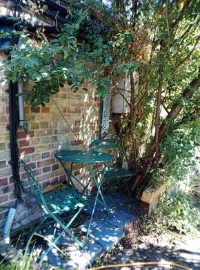 Shady sitting area opposite the boat