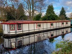 Residential mooring and garden with additional cabins