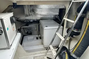 Engine room of 2022 Leopard 53 Powercat with equipment and ladder.