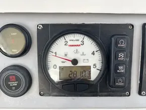 Control panel of a 2019 Leopard 40 with Yanmar RPM gauge and buttons.
