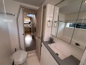 Modern bathroom interior on a 2019 Leopard 40 yacht, featuring sleek design and amenities.