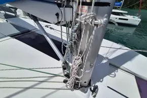 Ropes and mast on a 2021 Leopard 45 catamaran, docked near water.