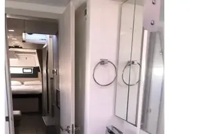 Modern bathroom interior on a 2020 Leopard 40 yacht, featuring sleek fixtures and a cozy cabin view.