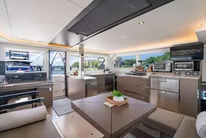 Luxurious interior of 2022 Leopard 50 yacht with modern kitchen and dining area.
