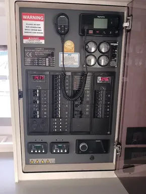 Electrical control panel on a 2021 Leopard 40 yacht, featuring gauges and switches.