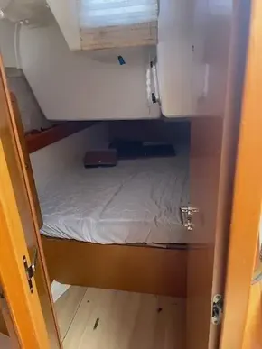 2017 Jeanneau Sun Odyssey 519 cabin with bed and storage.