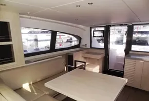 Interior of 2017 Leopard 43 Powercat with modern seating and large windows.