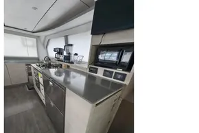 Modern kitchen interior on 2019 Leopard 50 yacht with stainless steel appliances.