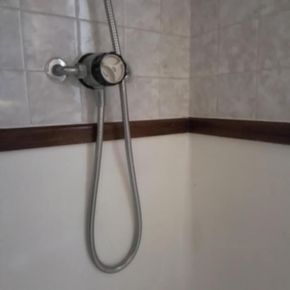 Shower over plastic bath