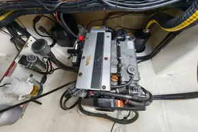 Engine compartment of a 2020 Leopard 50 yacht, showcasing detailed mechanical components.